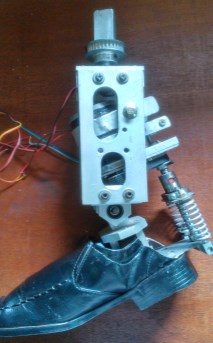 Photo of the 3DOF prosthetic limb prototype fitted with a shoe